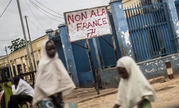 Photo 
d'archives d'un graffiti anti franais  Bangui dans le quartier  dominante 
musulmane PK5, le 4 juin 2014